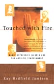 Book cover of Touched With Fire: Manic-Depressive Illness and the Artistic Temperament