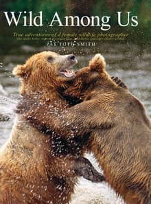 Book cover of Wild Among Us: True adventures of a female wildlife photographer who stalks bears, wolves, mountain lions, wild horses and other elusive wildlife